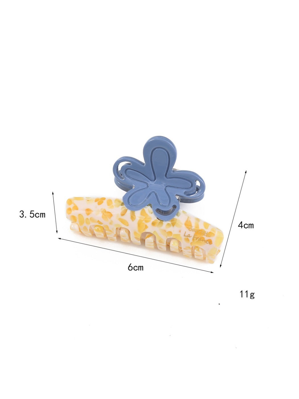 Side view of Beau flower shaped color block claw clip highlighting clip mechanism