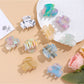 Side view of Beau vibrant acetate hair clip highlighting clasp mechanism