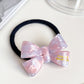 Iridescent Bow Hair Tie Collection variant image