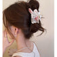 Rabbit character hair claw clip in an updo