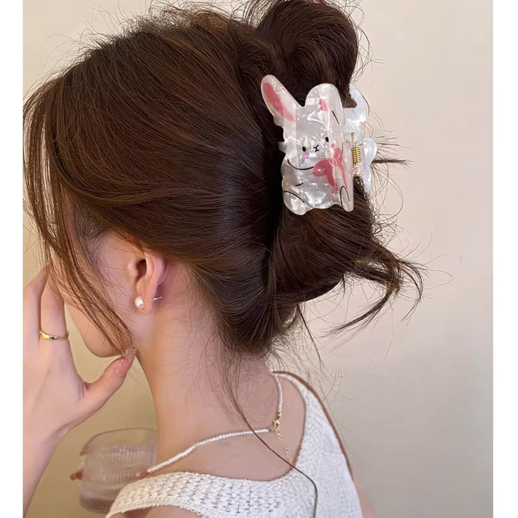 Rabbit character hair claw clip in an updo