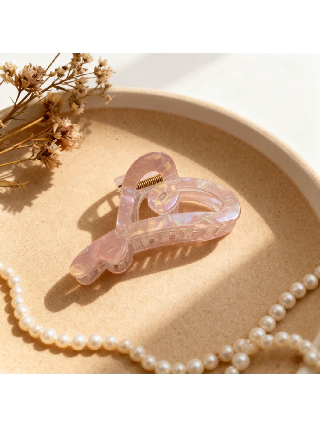 Beau heart shape hair claw displayed on white background