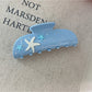 Beau starfish hair claw clip shown from the back with visible spring mechanism