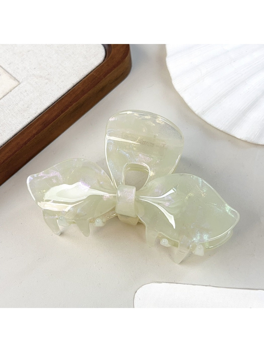 Beau hair claw clip shown from bottom to reveal teeth design