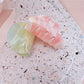 Side view of Beau gradient acrylic hair clip highlighting thickness and clasp mechanism