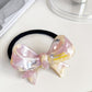 Iridescent Bow Hair Tie Collection variant image