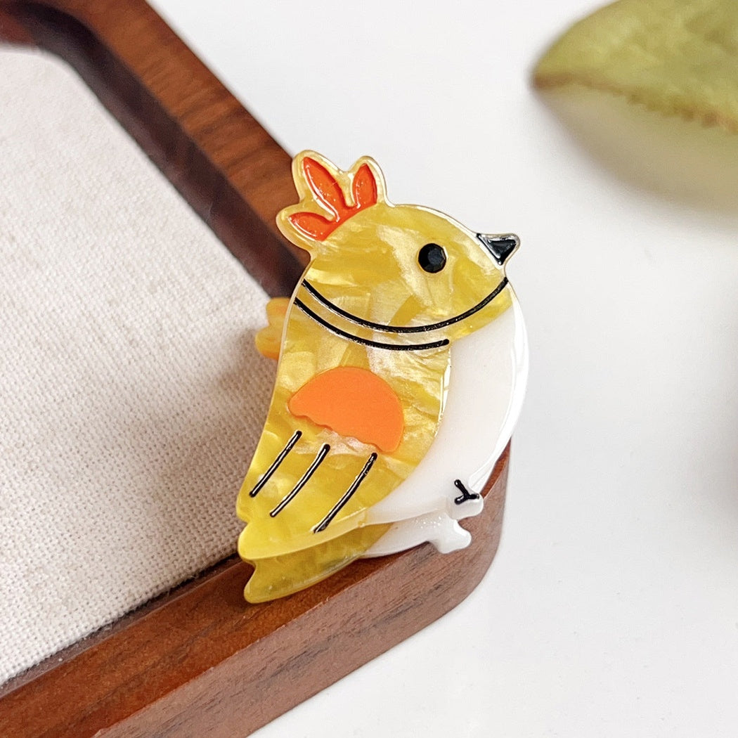 Yellow crowned bird hair claw clip