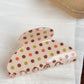 Yellow polka dot hair claw clip