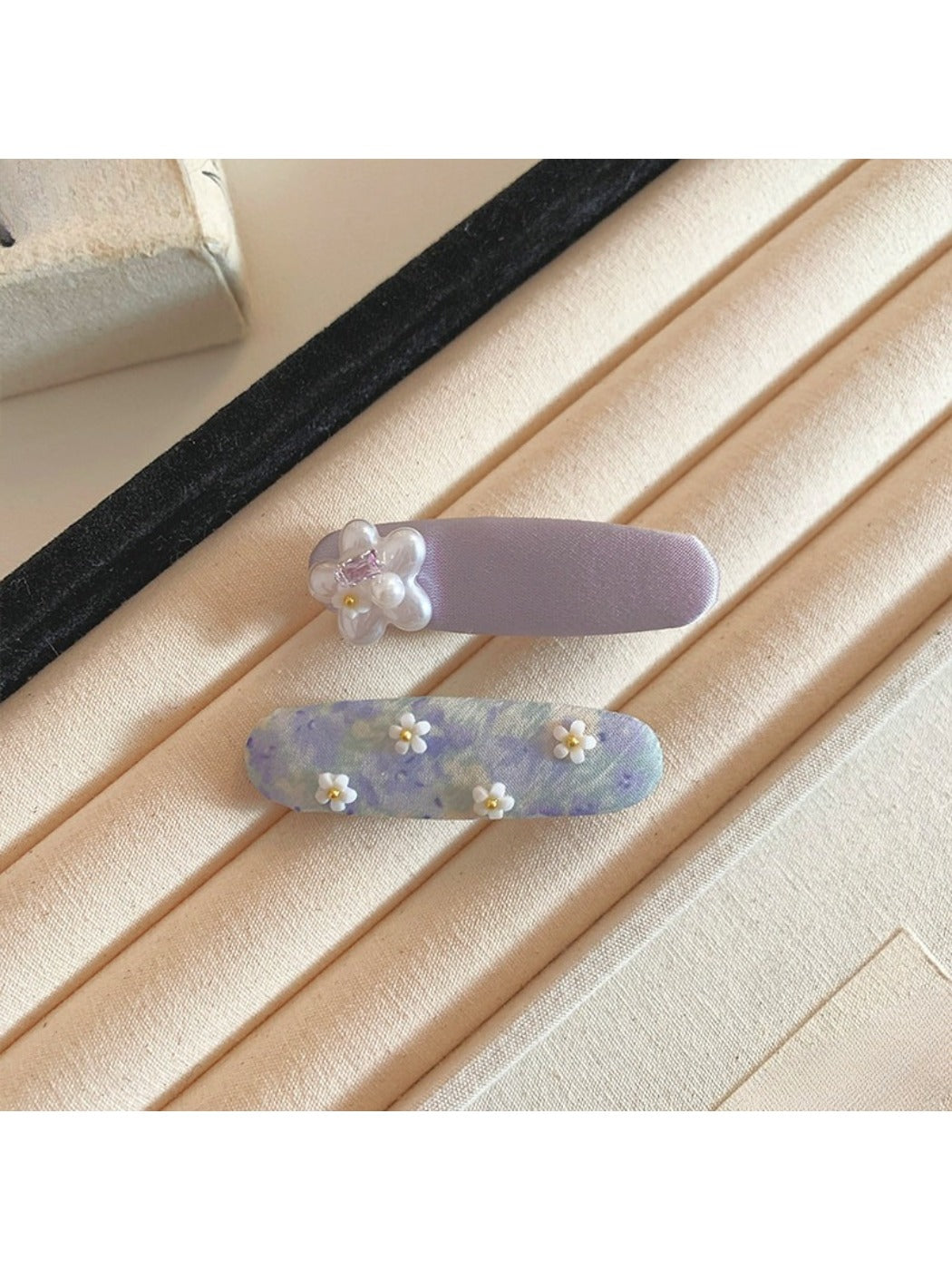 Side view of Beau tiny flower hair clip showing clip mechanism
