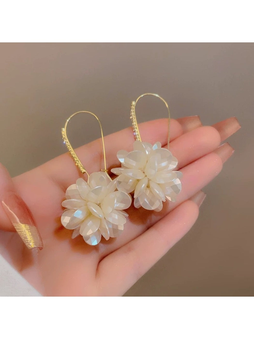 Detailed shot of the clasp and petal texture on Hydrangea shaped drop earrings