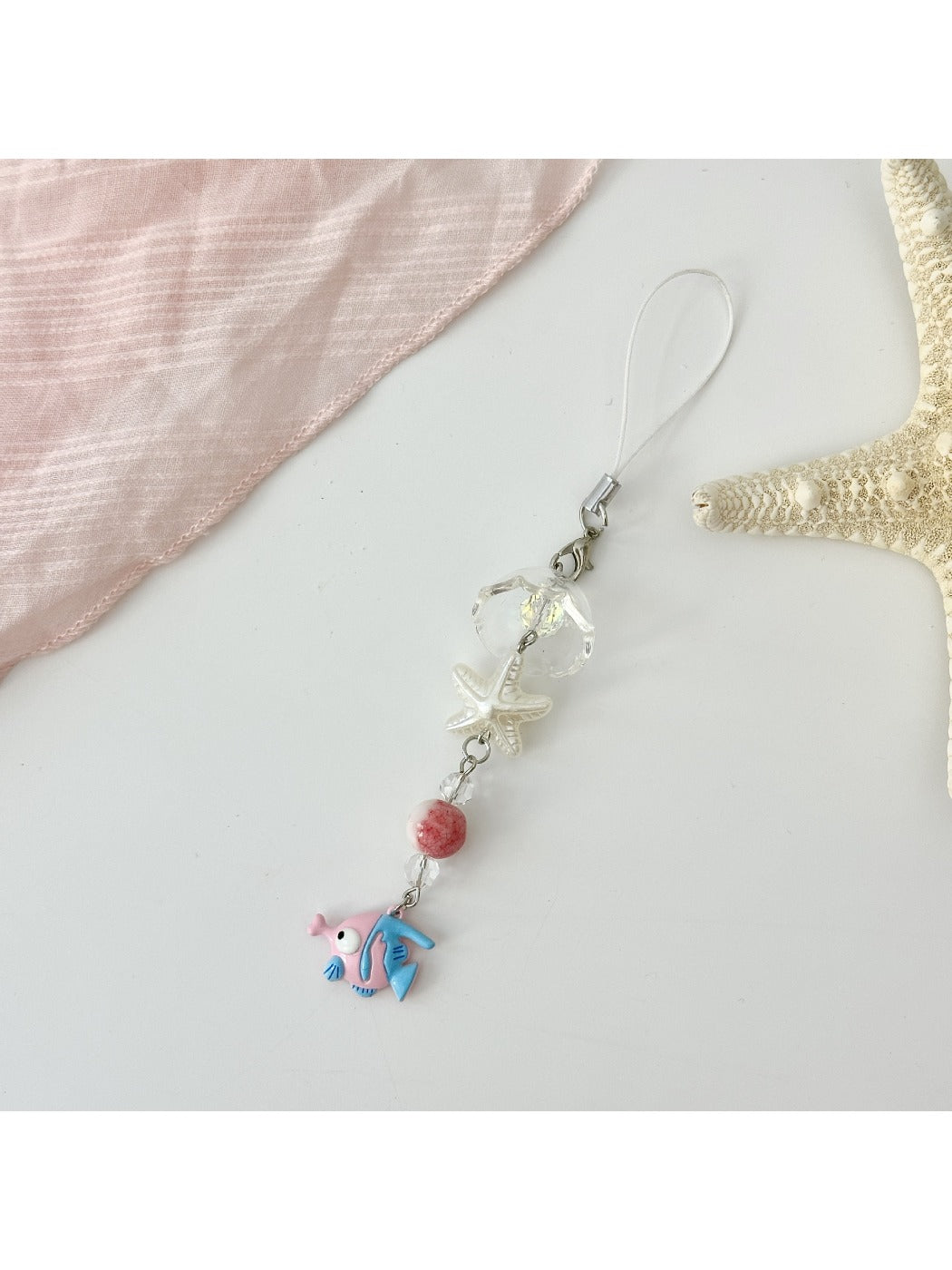 Mini fish keychain in yellow with detailed fins and eye features