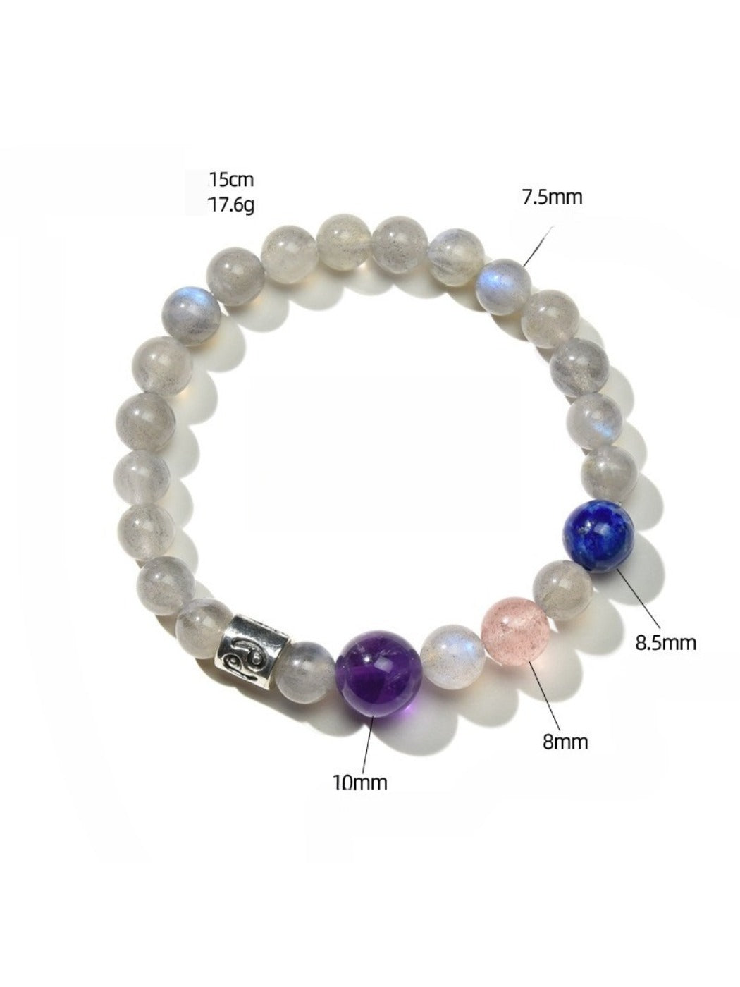 Multiple Lovra Zodiac Crystal Beaded Bracelets stacked on wrist with different zodiac charms