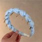 Gifty - Textured Toothed Curved Wrapped Headband