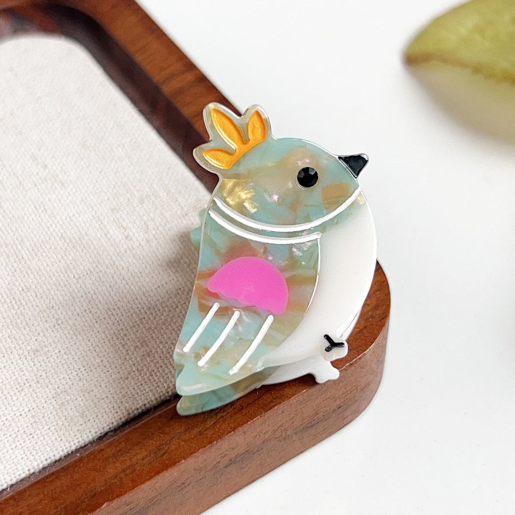 Green crowned bird hair claw clip