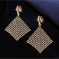 Earedge - Ornate Lion Head Tapered Dangle Earrings