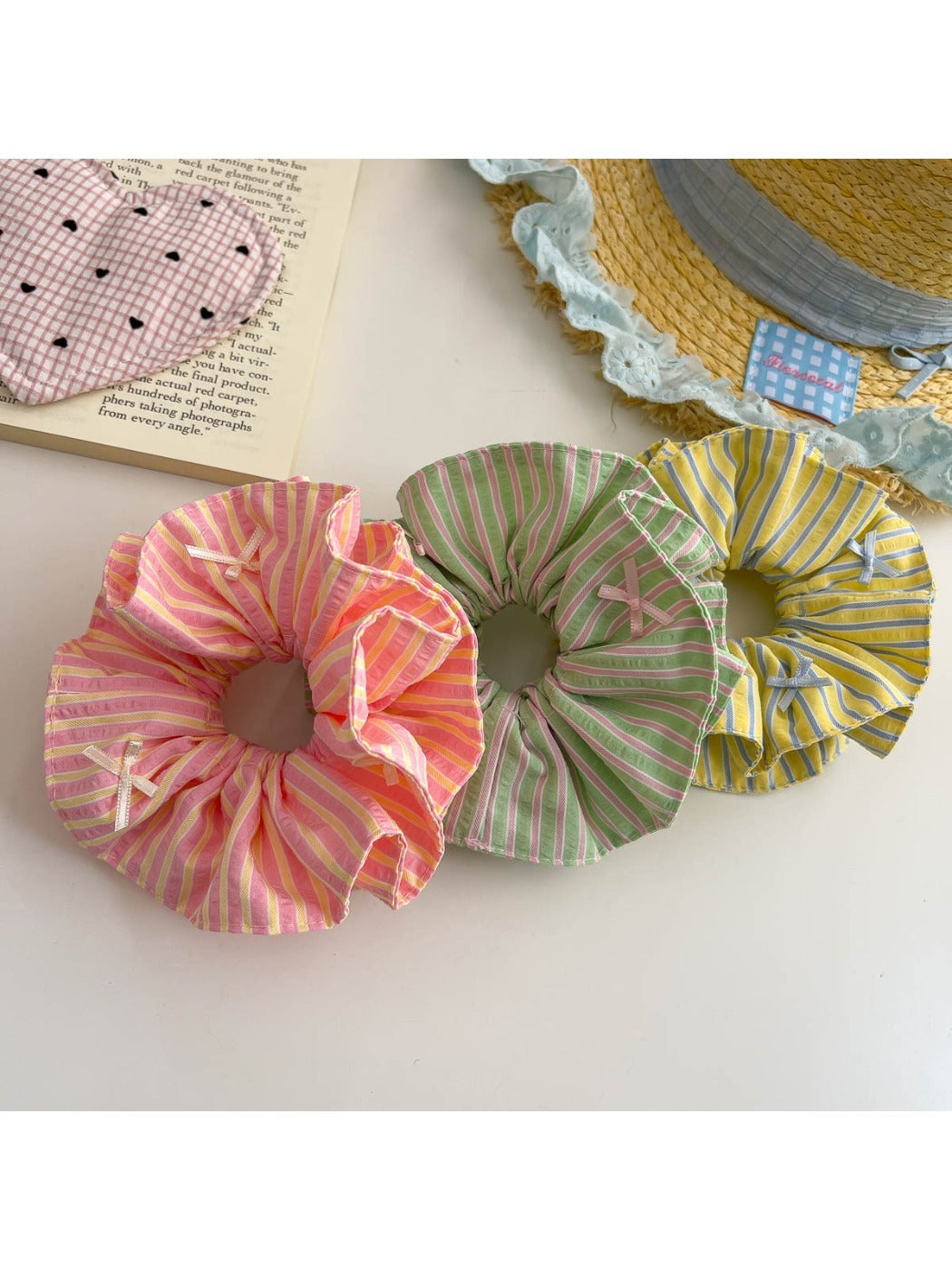 Gifty color block stripe scrunchie styled on a wrist as an accessory