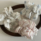 Gifty Sweet Lace Tiny Floral Scrunchie displayed on a white background showing texture and design