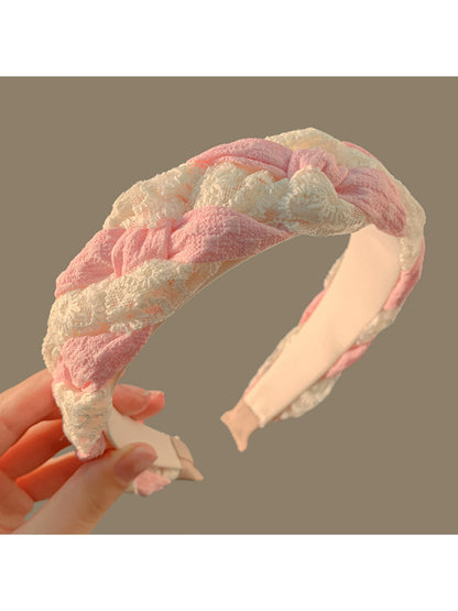 Side view of Gifty Happy Lace headband highlighting its flexible band and lace detail