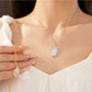 Nozari - Geometric Feather Accent Copper Pendant Necklace