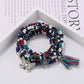 Lovra butterfly pendant bracelet worn on wrist with natural lighting
