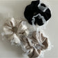 Gifty vintage tulle ruffle scrunchie styled in a model's hair