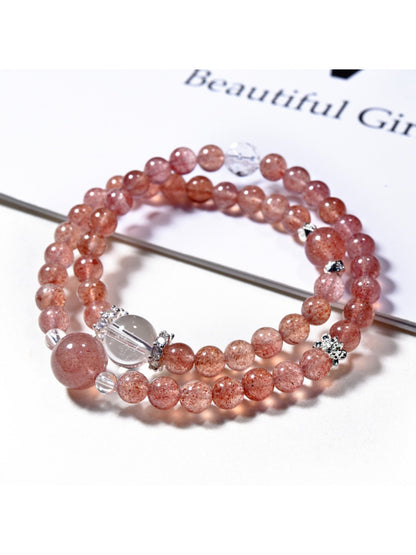 Lovra pink crystal beaded bracelet arranged in a circle highlighting bead color and clarity