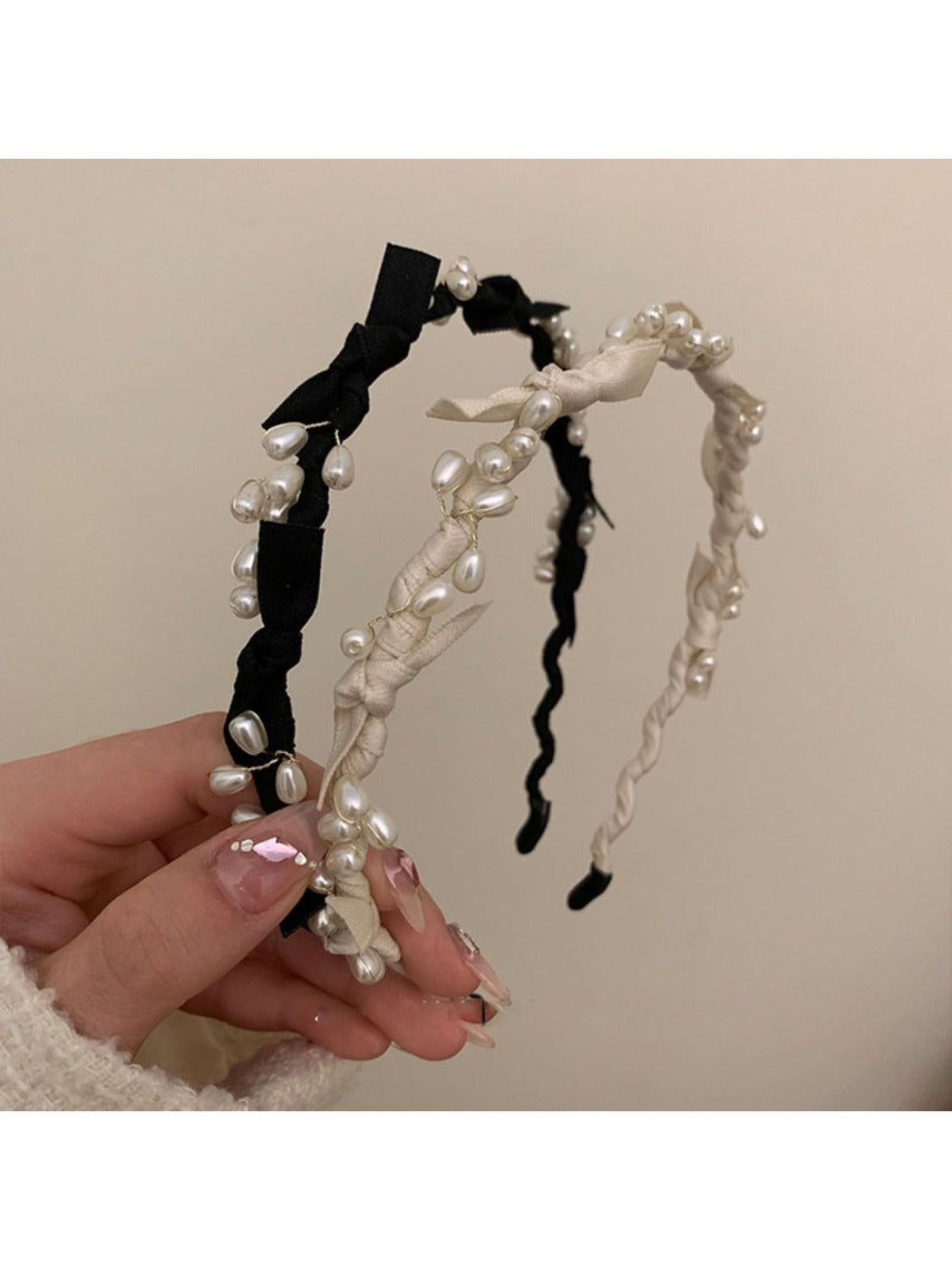 Close-up of Gifty Sweet Oval Bead Bow Headband showing oval beads and bow detail