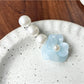 Beau Camellia shaped hair clip photographed with natural lighting