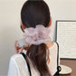 Gifty solid color scrunchie displayed on a white background emphasizing its shape