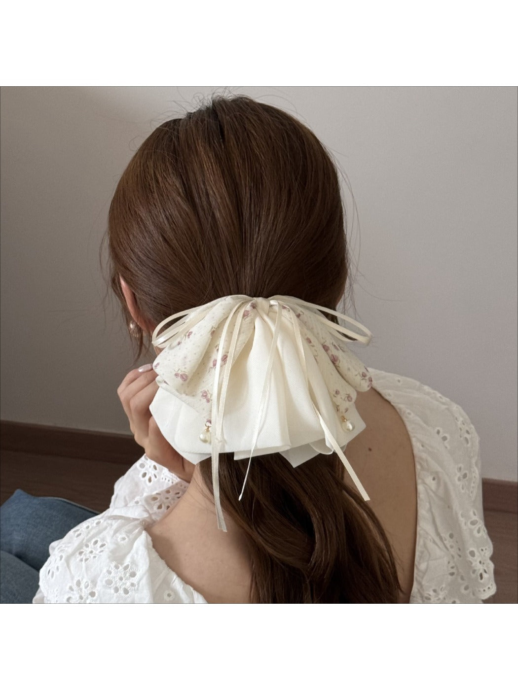 Close-up of Beau hair claw clip showing bow detail and smooth surface