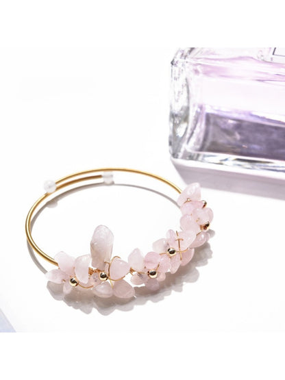 Lovra crystal charm bracelet with reflective crystals catching light