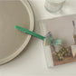 Beau bow bar hair clip displayed alongside matching minimalist hair accessories