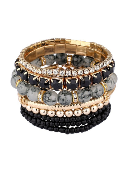 Detailed shot of beads and clasp on Lovra vintage layered beaded bracelet