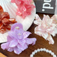Beau lotus hair claw clip open to display inner teeth and grip