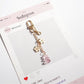 Keypus bag charm keychain displayed on a neutral background