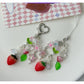 Sweet Tulip Strawberry keychain with red strawberry and green leaves on a silver key ring