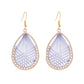 Earedge Cord Woven Teardrop Earrings displayed with matching accessories on a neutral background