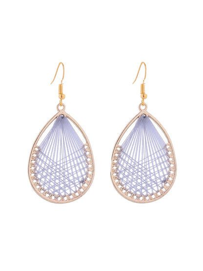 Earedge Cord Woven Teardrop Earrings displayed with matching accessories on a neutral background