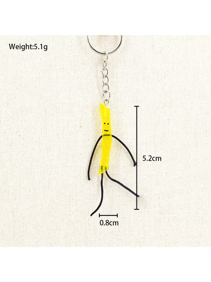 Mini French fries keychain displayed with other novelty keychains
