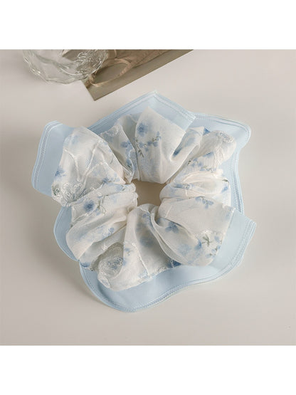 Top view of Gifty Sweet Graceful Floral Scrunchie showing floral print and elastic band