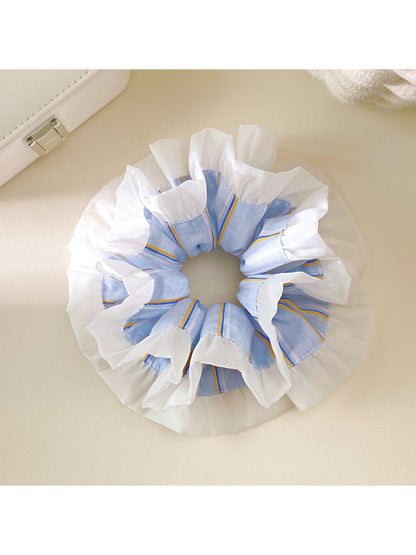 Double layer blue stripe ruffle scrunchie on a white background