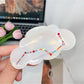 Beau elegant hair claw clip placed on a textured surface for aesthetic display