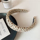 Top view of Gifty wide headband showing full floral print coverage