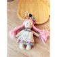 Keypus cartoon doll keychain held in hand to show size and details