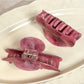 Side view of Beau pink ombre hair claw clip highlighting clip mechanism