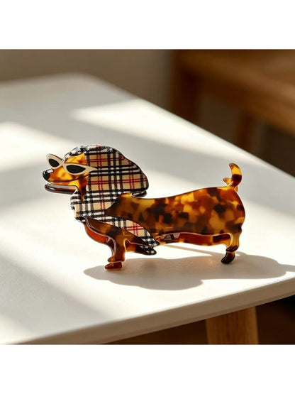 Close-up of Beau cartoon dachshund claw clip dog face with black nose and eyes