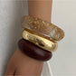 Close-up of Lovra stackable bracelet showing polished surface and clasp detail