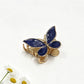 Beau butterfly hair clip in pastel purple displayed with matching accessories