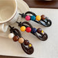 Beau colorful round bead bar hair clip with multicolored beads on gold bar