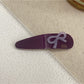 Beau - Bow Embellished Oval Hair Clip